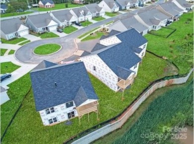 This spacious ranch-style home in a lovely 55+ community in Fort on Fort Mill Golf Club in South Carolina - for sale on GolfHomes.com, golf home, golf lot