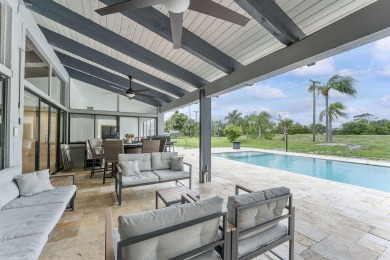 This beautiful modern home has lots of upgrades. It's a true on Ocean Breeze Golf and Country Club in Florida - for sale on GolfHomes.com, golf home, golf lot