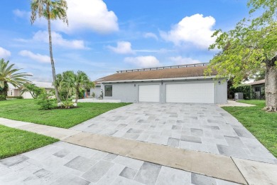This beautiful modern home has lots of upgrades. It's a true on Ocean Breeze Golf and Country Club in Florida - for sale on GolfHomes.com, golf home, golf lot