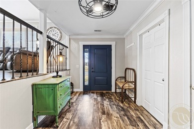 Welcome to 148 Glenhaven Drive, a spacious tri-level home in the on Lake Hills Golf Course in Montana - for sale on GolfHomes.com, golf home, golf lot