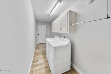 This beautifully updated 3-bedroom, 2-bathroom home is just a on Signal Hill Golf Course, Inc. in Florida - for sale on GolfHomes.com, golf home, golf lot