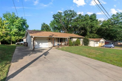 This 3-bed, 2-bath ranch home offers a prime location backing to on Cape Girardeau Country Club in Missouri - for sale on GolfHomes.com, golf home, golf lot