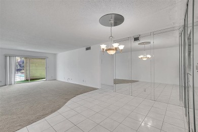 Introducing 2504 Antigua Terrace, a beautifully updated 2BR/2BA on Wynmoor Golf Course in Florida - for sale on GolfHomes.com, golf home, golf lot