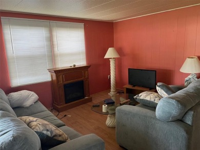 Palm Hill Country Club is a premier 55+ manufactured home on Palm Hill Golf Club in Florida - for sale on GolfHomes.com, golf home, golf lot