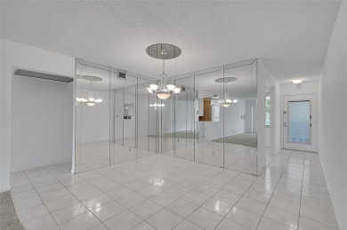 Introducing 2504 Antigua Terrace, a beautifully updated 2BR/2BA on Wynmoor Golf Course in Florida - for sale on GolfHomes.com, golf home, golf lot