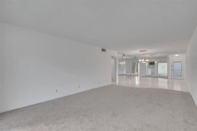 Introducing 2504 Antigua Terrace, a beautifully updated 2BR/2BA on Wynmoor Golf Course in Florida - for sale on GolfHomes.com, golf home, golf lot