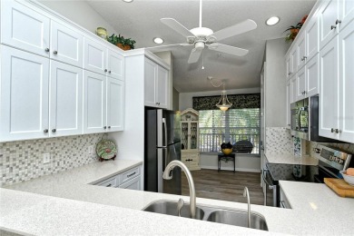 Nestled in the private community of Heritage Oaks Golf & Country on Heritage Oaks Golf and Country Club in Florida - for sale on GolfHomes.com, golf home, golf lot