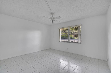 Introducing 2504 Antigua Terrace, a beautifully updated 2BR/2BA on Wynmoor Golf Course in Florida - for sale on GolfHomes.com, golf home, golf lot
