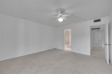 Introducing 2504 Antigua Terrace, a beautifully updated 2BR/2BA on Wynmoor Golf Course in Florida - for sale on GolfHomes.com, golf home, golf lot