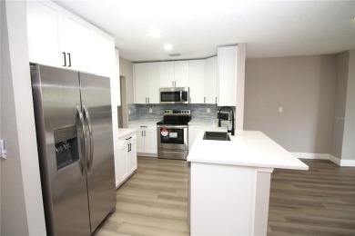 Low annual HOA! Beautifully renovated 3 bedroom, 2 bath 1805 sq on North Lakes Golf Course in Florida - for sale on GolfHomes.com, golf home, golf lot