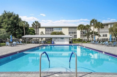 Introducing 2504 Antigua Terrace, a beautifully updated 2BR/2BA on Wynmoor Golf Course in Florida - for sale on GolfHomes.com, golf home, golf lot