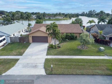 Discover this remarkable eco-friendly retreat in beautiful Boca on Southwinds Golf Course in Florida - for sale on GolfHomes.com, golf home, golf lot