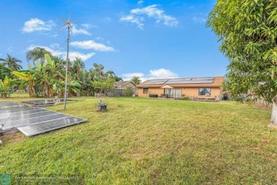 Discover this remarkable eco-friendly retreat in beautiful Boca on Southwinds Golf Course in Florida - for sale on GolfHomes.com, golf home, golf lot