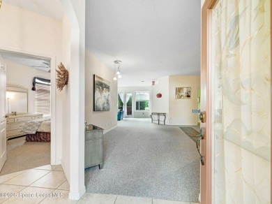 Viera East Golf Course Beauty! LIVE the easy lifestyle in this on  in Florida - for sale on GolfHomes.com, golf home, golf lot