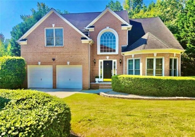 Experience refined living as this stately brick residence is on Southland Country Club in Georgia - for sale on GolfHomes.com, golf home, golf lot