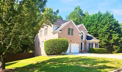 Experience refined living as this stately brick residence is on Southland Country Club in Georgia - for sale on GolfHomes.com, golf home, golf lot