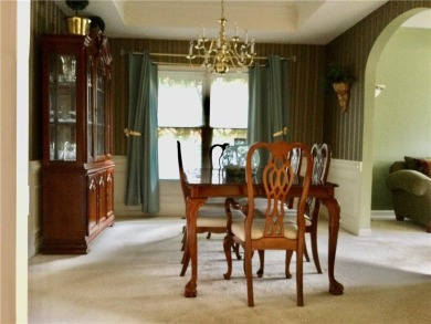 Experience refined living as this stately brick residence is on Southland Country Club in Georgia - for sale on GolfHomes.com, golf home, golf lot