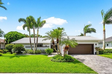 This serene house is situated on a picturesque golf course on Delaire Golf and Country Club in Florida - for sale on GolfHomes.com, golf home, golf lot