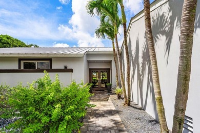 This serene house is situated on a picturesque golf course on Delaire Golf and Country Club in Florida - for sale on GolfHomes.com, golf home, golf lot