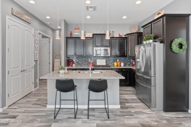 Welcome to this impeccably maintained home nestled in the highly on Verrado Golf Club  in Arizona - for sale on GolfHomes.com, golf home, golf lot