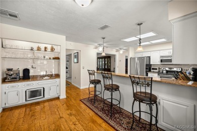 Welcome to a true hidden gem--where luxury living meets hobbyist on Rainbows End Golf Club in Florida - for sale on GolfHomes.com, golf home, golf lot