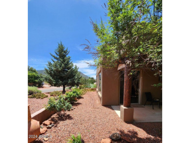 This Sedona home in Firecliff offers STUNNING RED ROCK VIEWS on Canyon Mesa Country Club in Arizona - for sale on GolfHomes.com, golf home, golf lot