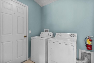 BOND PAID! TURNKEY! Welcome to this charming 2-bedroom, 2-bath on The Links of Spruce Creek in Florida - for sale on GolfHomes.com, golf home, golf lot
