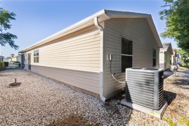 BOND PAID! TURNKEY! Welcome to this charming 2-bedroom, 2-bath on The Links of Spruce Creek in Florida - for sale on GolfHomes.com, golf home, golf lot