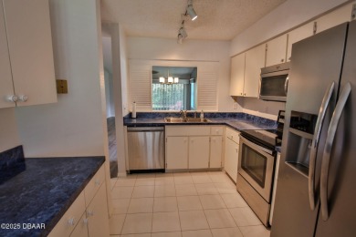 This ONE-STORY GATED townhome is a FABULOUS FIND! It has a great on The Club At Pelican Bay - North Course in Florida - for sale on GolfHomes.com, golf home, golf lot