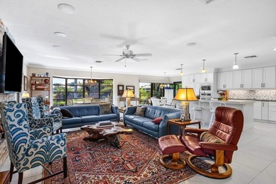 Beautiful lake & golf views in this beautifully updated on Quail Ridge Golf Course and Country Club in Florida - for sale on GolfHomes.com, golf home, golf lot