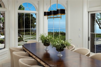 Situated on a prized front-row lot, this Pelican Crest showpiece on Pelican Hill Golf Club in California - for sale on GolfHomes.com, golf home, golf lot