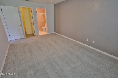 This ONE-STORY GATED townhome is a FABULOUS FIND! It has a great on The Club At Pelican Bay - North Course in Florida - for sale on GolfHomes.com, golf home, golf lot