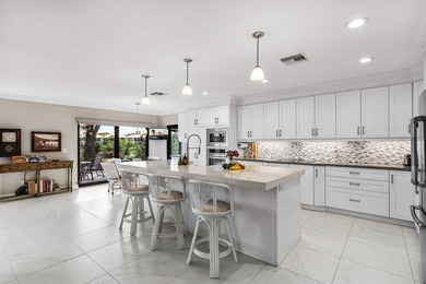 Beautiful lake & golf views in this beautifully updated on Quail Ridge Golf Course and Country Club in Florida - for sale on GolfHomes.com, golf home, golf lot