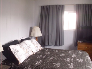 This well-maintained Double wide manufactured home 2-bedroom 1 & on The Club At Shenandoah Springs in California - for sale on GolfHomes.com, golf home, golf lot