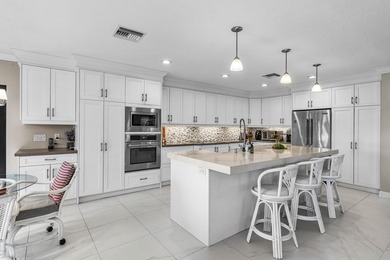 Beautiful lake & golf views in this beautifully updated on Quail Ridge Golf Course and Country Club in Florida - for sale on GolfHomes.com, golf home, golf lot