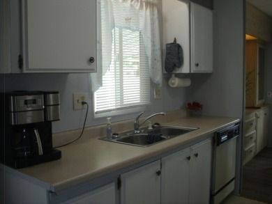 This well-maintained Double wide manufactured home 2-bedroom 1 & on The Club At Shenandoah Springs in California - for sale on GolfHomes.com, golf home, golf lot