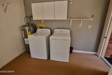 This ONE-STORY GATED townhome is a FABULOUS FIND! It has a great on The Club At Pelican Bay - North Course in Florida - for sale on GolfHomes.com, golf home, golf lot