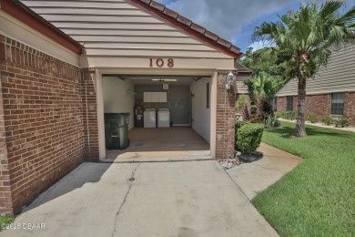 This ONE-STORY GATED townhome is a FABULOUS FIND! It has a great on The Club At Pelican Bay - North Course in Florida - for sale on GolfHomes.com, golf home, golf lot