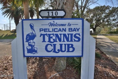 This ONE-STORY GATED townhome is a FABULOUS FIND! It has a great on The Club At Pelican Bay - North Course in Florida - for sale on GolfHomes.com, golf home, golf lot
