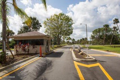 This ONE-STORY GATED townhome is a FABULOUS FIND! It has a great on The Club At Pelican Bay - North Course in Florida - for sale on GolfHomes.com, golf home, golf lot