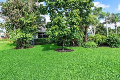 Beautiful lake & golf views in this beautifully updated on Quail Ridge Golf Course and Country Club in Florida - for sale on GolfHomes.com, golf home, golf lot