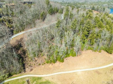 This 1 acre lot while gently sloping, overlooks the 17th green on Lake Toxaway Country Club in North Carolina - for sale on GolfHomes.com, golf home, golf lot
