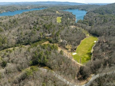This 1 acre lot while gently sloping, overlooks the 17th green on Lake Toxaway Country Club in North Carolina - for sale on GolfHomes.com, golf home, golf lot