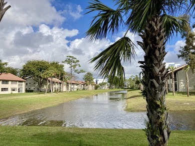 Beautifully renovated spacious 2-bedroom, 2-bath first-floor on Fountains Golf and Country Club in Florida - for sale on GolfHomes.com, golf home, golf lot