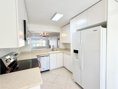 Beautifully updated spacious 2-bedroom, 2-bath first-floor condo on Fountains Golf and Country Club in Florida - for sale on GolfHomes.com, golf home, golf lot