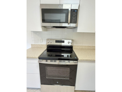 Beautifully renovated spacious 2-bedroom, 2-bath first-floor on Fountains Golf and Country Club in Florida - for sale on GolfHomes.com, golf home, golf lot