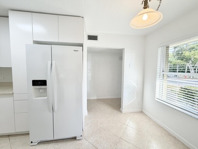 Beautifully updated spacious 2-bedroom, 2-bath first-floor condo on Fountains Golf and Country Club in Florida - for sale on GolfHomes.com, golf home, golf lot
