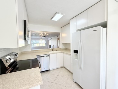 Beautifully renovated spacious 2-bedroom, 2-bath first-floor on Fountains Golf and Country Club in Florida - for sale on GolfHomes.com, golf home, golf lot