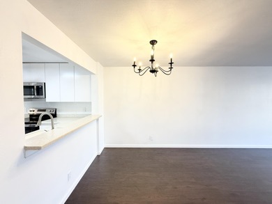 Beautifully updated spacious 2-bedroom, 2-bath first-floor condo on Fountains Golf and Country Club in Florida - for sale on GolfHomes.com, golf home, golf lot