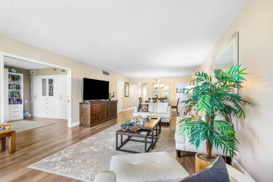 Spacious 3-Bedroom Condo with Stunning Lake, Garden, and Golf on Palm-Aire Country Club and Resort - The Oaks in Florida - for sale on GolfHomes.com, golf home, golf lot